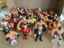 Collection of 35 Hasbro WWE Figures Wrestling Figures