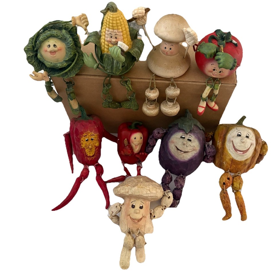 A set of 9 vintage anthropomorphic veggie shelf-sitters — the kind of delightfully weird kitchen decor that stops guests mid-sentence.