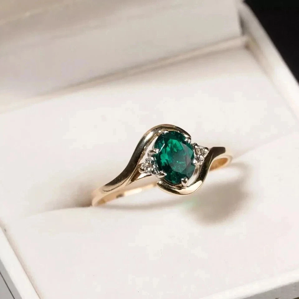 Anillo banda bypass para mujer enchapado en oro amarillo de 14 k esmeralda simulada corte ovalado de 1 quilate Foto 3 de 4