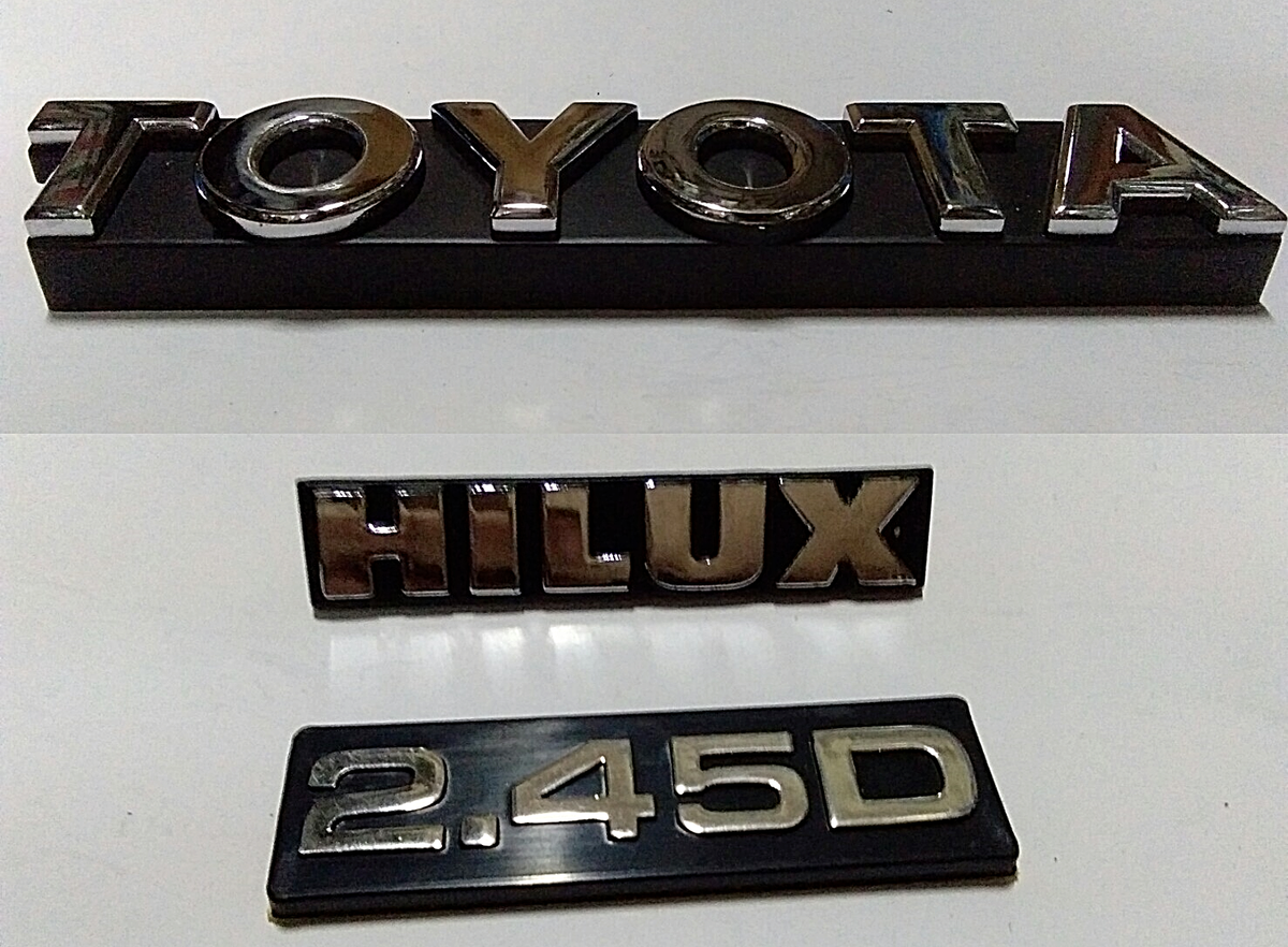 Toyota Hilux pickup LN 50-56 RN50 Front grille side emblem badge