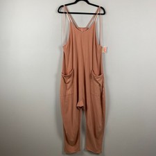 Free People Movement FP Hot Shot Romper Jumpsuit Size M Petal Pink Pockets
