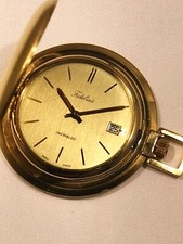 MP 31 Montre de poche en plaqué or avec date