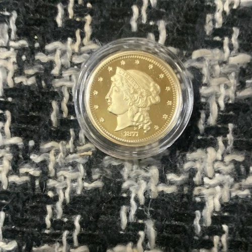 Liberty 1877 Gold Fantasy Issue Coin Uncirculated in Protective Capsule