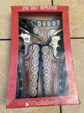 NOS VINTAGE HUBLEY 250 SHOT REPEATER TEXAN JR CAP GUNS  LEATHER DOUBLE HOLSTER