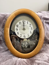 Rhythm Small World Oak Timecracker Sound & Magic Motion Clock 4MH777