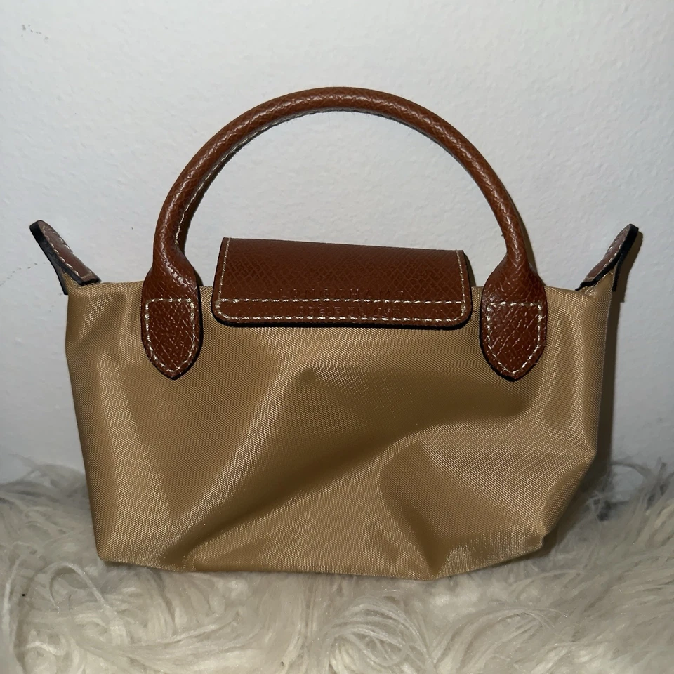 Mini bolso de hombro Longchamp Le Pliage XS marrón claro W8in Outlet sin usar Foto 3 de 4