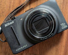 Exc Nikon COOLPIX S9300 16.0MP Digital Camera 18x Optica Zoom English Black