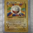 Pokémon TCG Electrode Base Set 21/102 Regular 1st Edition Rare