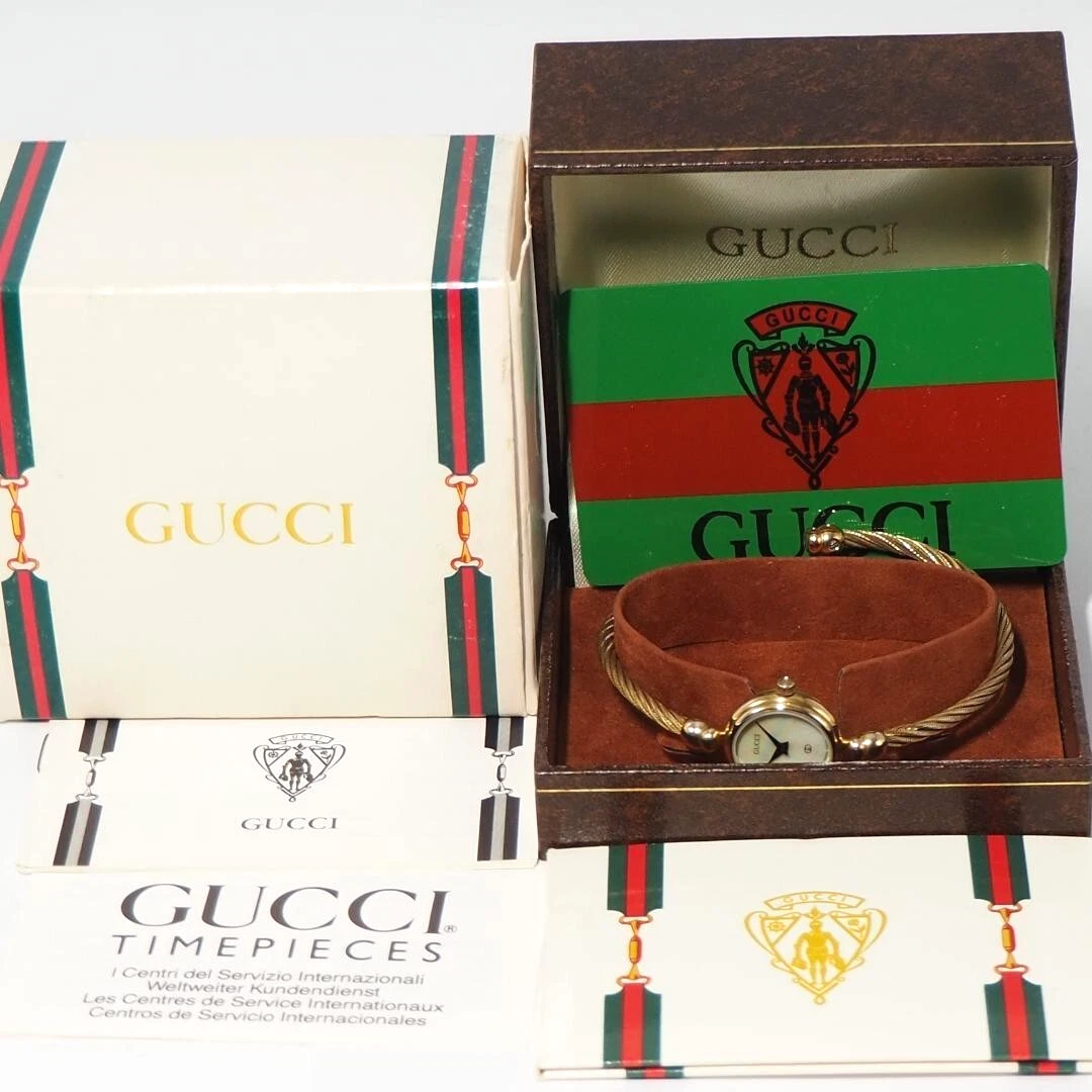 Bracelet montre femme Gucci cadran coquillage doré suisse vintage authentique 2047L avec boite