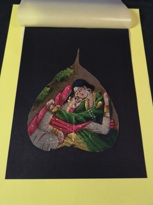 Two women. Indian miniature painting on a Bodhi tree leaf. 705940
