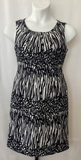 Calvin Klein ladies size 4 sleeveless dress with pleated collar area.