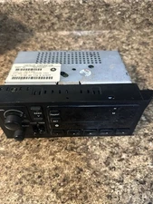Chrysler Corporation OEM AM/FM Stock Car Vehicle Stereo Part No. P04704357