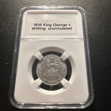1916 silver  one shilling   uncirculated slabbed 