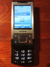 Vintage Nokia RM240 Carl Zeiss mobile phone charger headphones, working