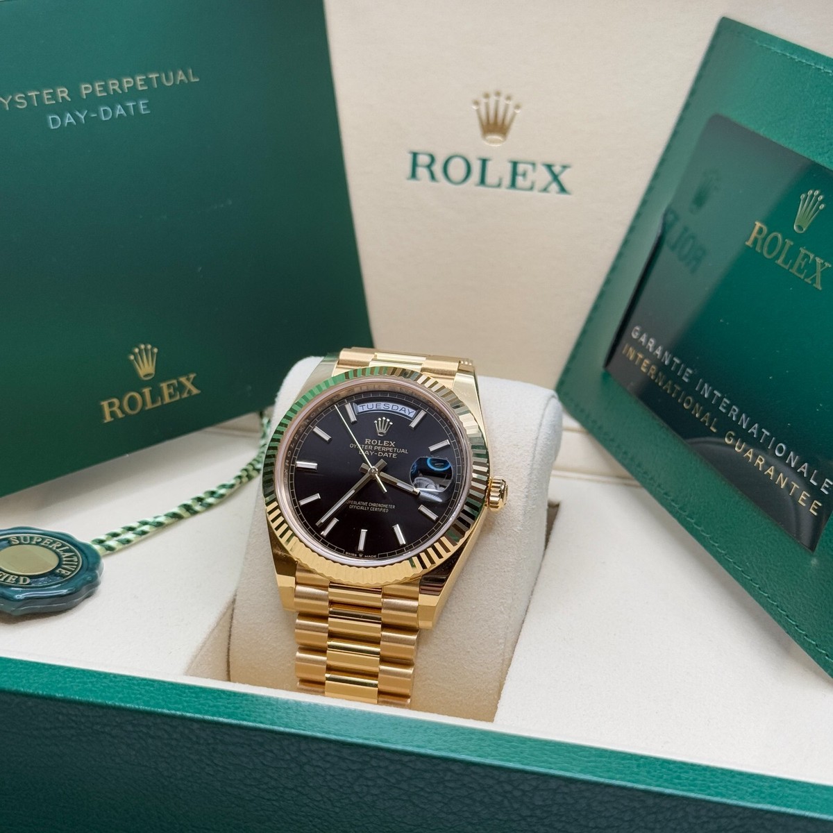 Rolex Day-Date 40 NEW 2025 Black Dial 18k Yellow Gold Fluted Bezel