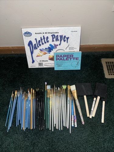 Lot Of Paintbrushes And Palette Paper