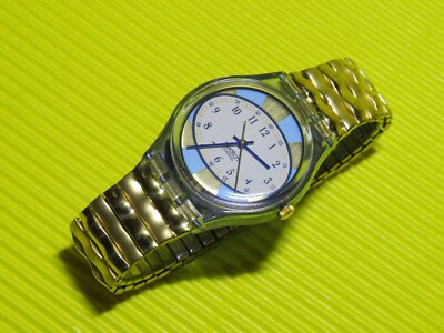 Swatch MILK SHAKE mit goldfarbenem FLEX Armband in NEU aber OHNE Schachtel