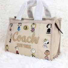 COACH x Peanuts Cargo 26 Beige Canvas Snoopy Embroidered 2Way Crossbody Tote Bag