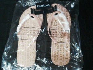 bebe gold flip flops