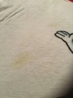 Vintage 80s Trix Rabbit cereal ringer shirt, size M, with faint yellow-spore mark on white fabric.