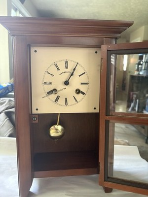 Wooden mantel clock by New England Clock Co.