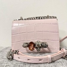 Borsa Alexander McQueen Jewelled Satchel rosa in pelle con nocche e teschio i...