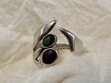 Mike Smith, Navajo silversmith, Ring size 8 1/2. Turquoise and Sugilite.