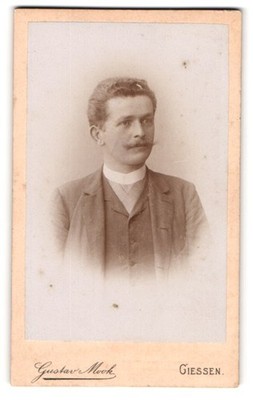 Photograph Gustav Mook, Giessen, Diezstrasse 4, young man in suit with snout 