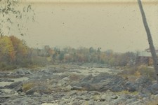 1950s 35mm Slide Rocky Riverbed Autumn Trees Foliage Water Stones Boulders Muted