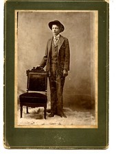 Tall-Thin Young Man-Studio Fur Rug-Chair-Full Length Vintage Cabinet Photograph
