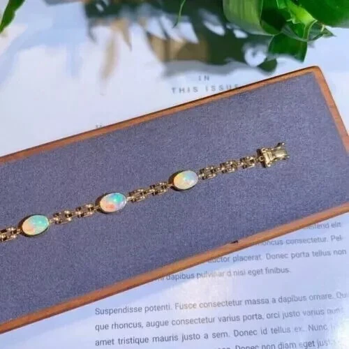 Brazalete para mujer de diamantes de ópalo de fuego creado en laboratorio ovalado de 8 quilates enchapado en oro amarillo de 14 quilates Foto 4 de 4
