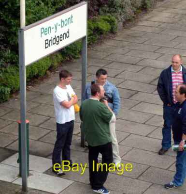 Photo 6x4 Passengers wait at Bridgend  Station for another late train. Ne c2005