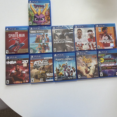Sony PS4 Game Lot: NBA 2K20, Marvel Spider-Man, Spyro, Madden NFL, COD, Sims 4