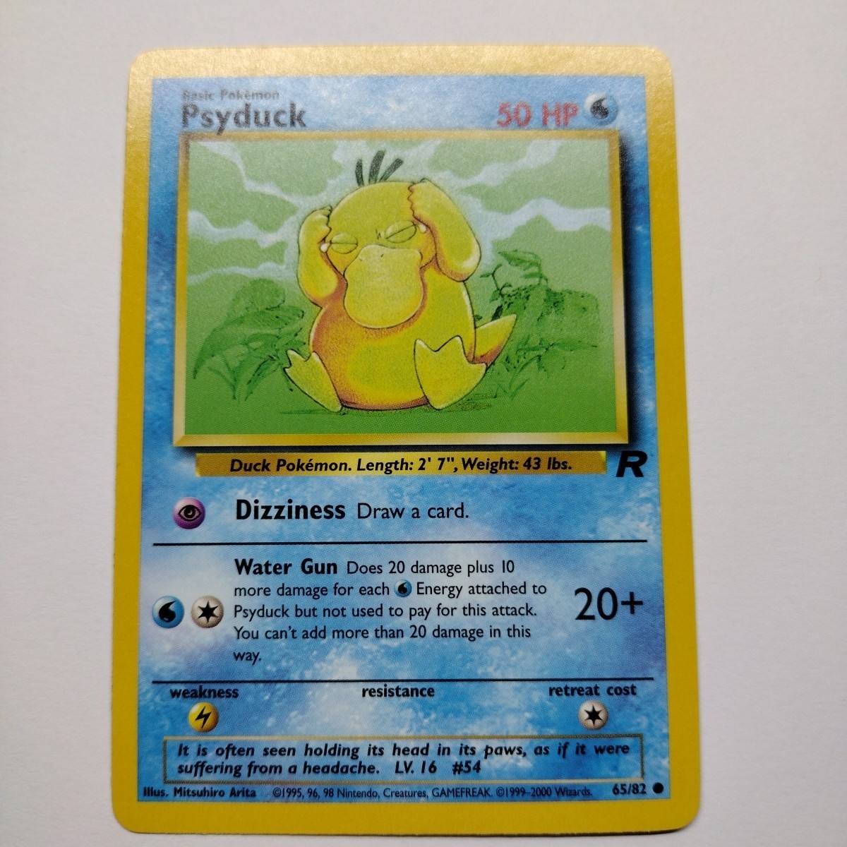 Psyduck 65/82 Team Rocket Vintage Pokemon Card - NM