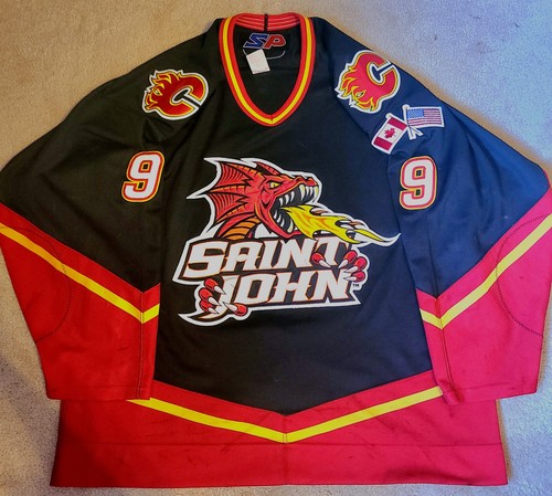 SP Game Worn Saint John Flames Brown #9 AHL Hockey Jersey Size 56 Black Red