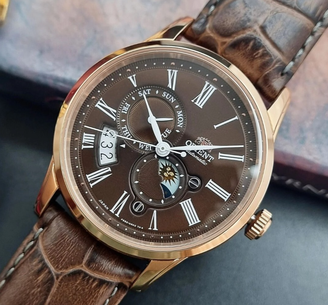 Orologio da uomo Orient Sun and Moon automatico quadrante marrone cinturino...