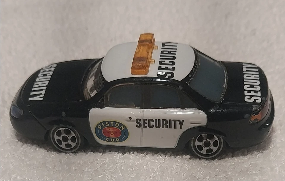 Disney Pixar Cars Lenticular Eyes Marlon Clutches McKay Security 2009 1:55 Foto 2 de 4