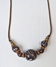 multisize beaded necklace brown string aprox 24" length boho