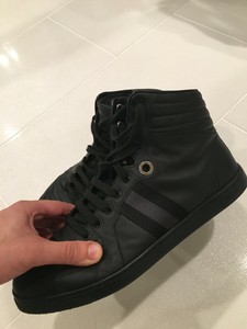 black high top designer sneakers