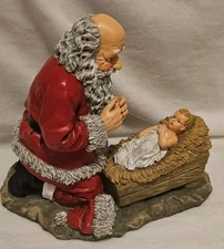 Vintage 1996 Roman Inc Kneeling Santa Praying Over Baby Jesus Statue Figurine