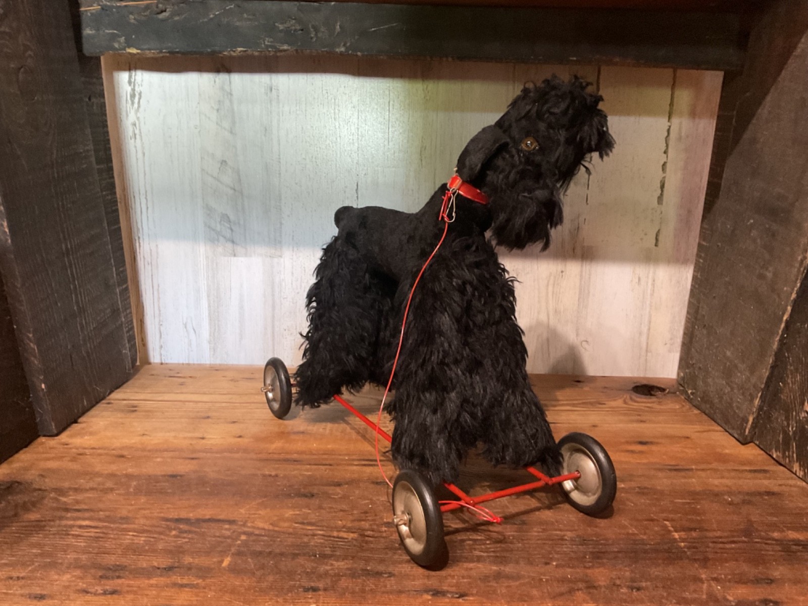 Vintage Black Poodle Pull Toy with Red Base and Wheels