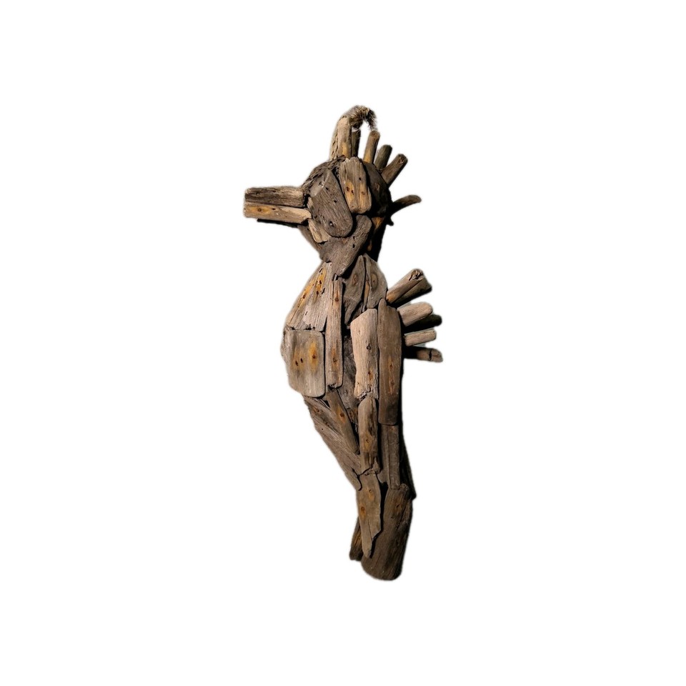 A sculptural wall hanging crafted from natural driftwood into a seahorse totem — coastal folk art with genuine soul and texture.