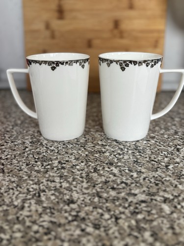 2 Ciroa Mirabelle White fine bone China mugs cups Lip decorated In silver