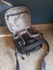 nikon d3100 black camera with bag with 18-55mm lense and 55-200mm no battery