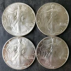Lot of Four 1987 $1 American Silver Eagle Dollars