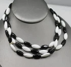 Vintage black & white oval milk glass beads necklace 46" needs restringing