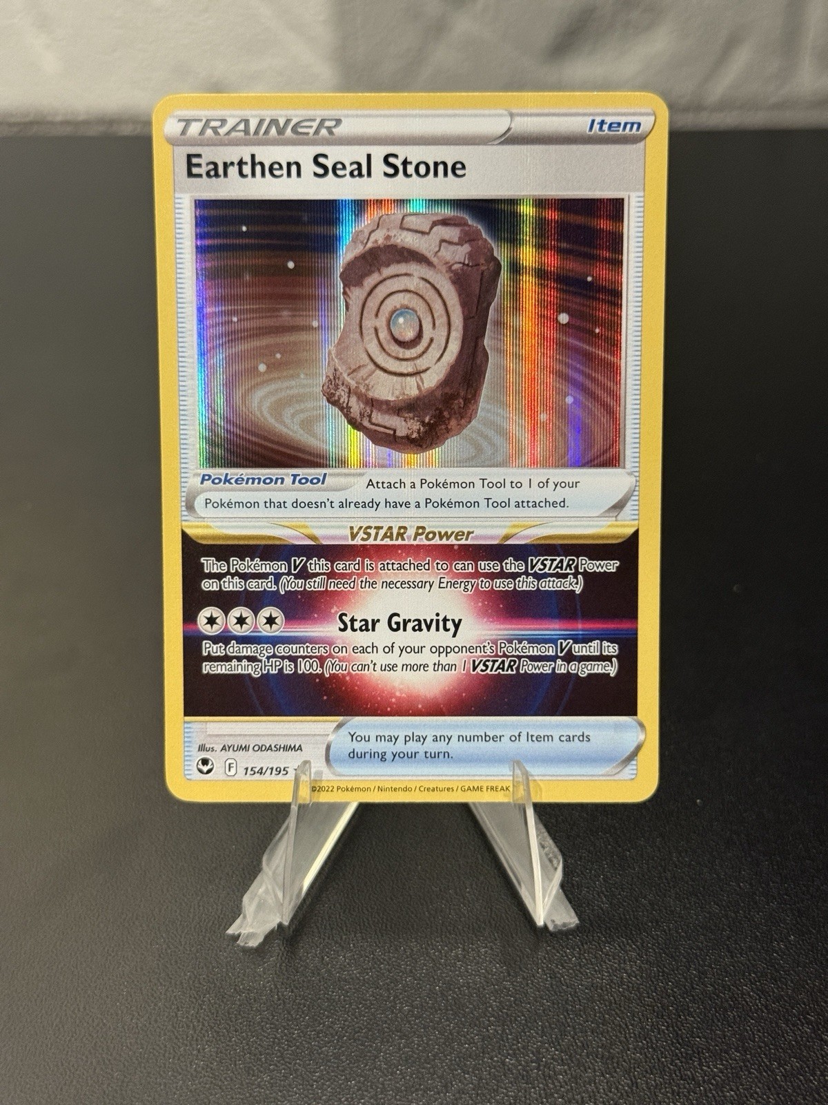 Pokemon: Earthen Seal Stone #154/195 Pokemon Silver Tempest Holo Rare - NM