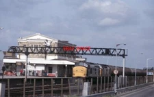 PHOTO  CLASS 37 37215 WITH A CLASSMATE ON AN OIL TANK TRAIN PASSING SWINDON ON 0