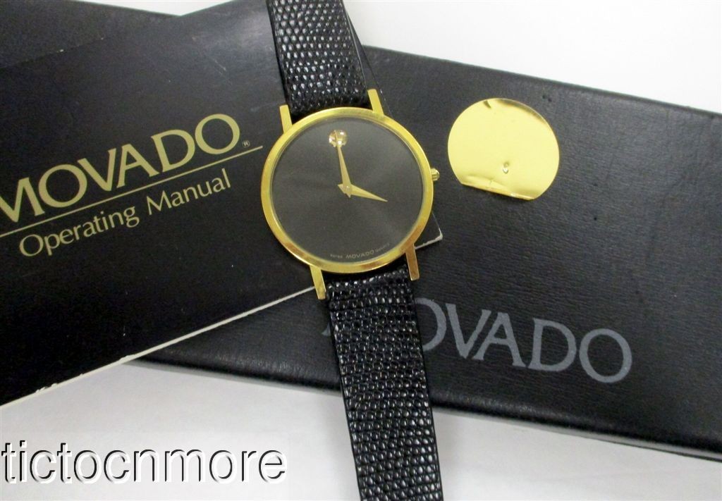 CLASSIC 87-45-882 &amp; BLACK RETRO 34mm MUSEM QUARTZ DIAL WATCH BOX MOVADO MENS - vintagewatches.pk