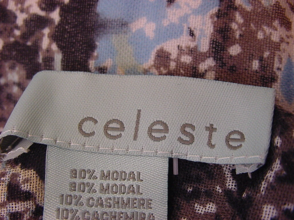 NUEVO CON ETIQUETAS - BUFANDA CELESTE 27X80 ESTAMPADO PITÓN AZUL  Foto 4 de 4